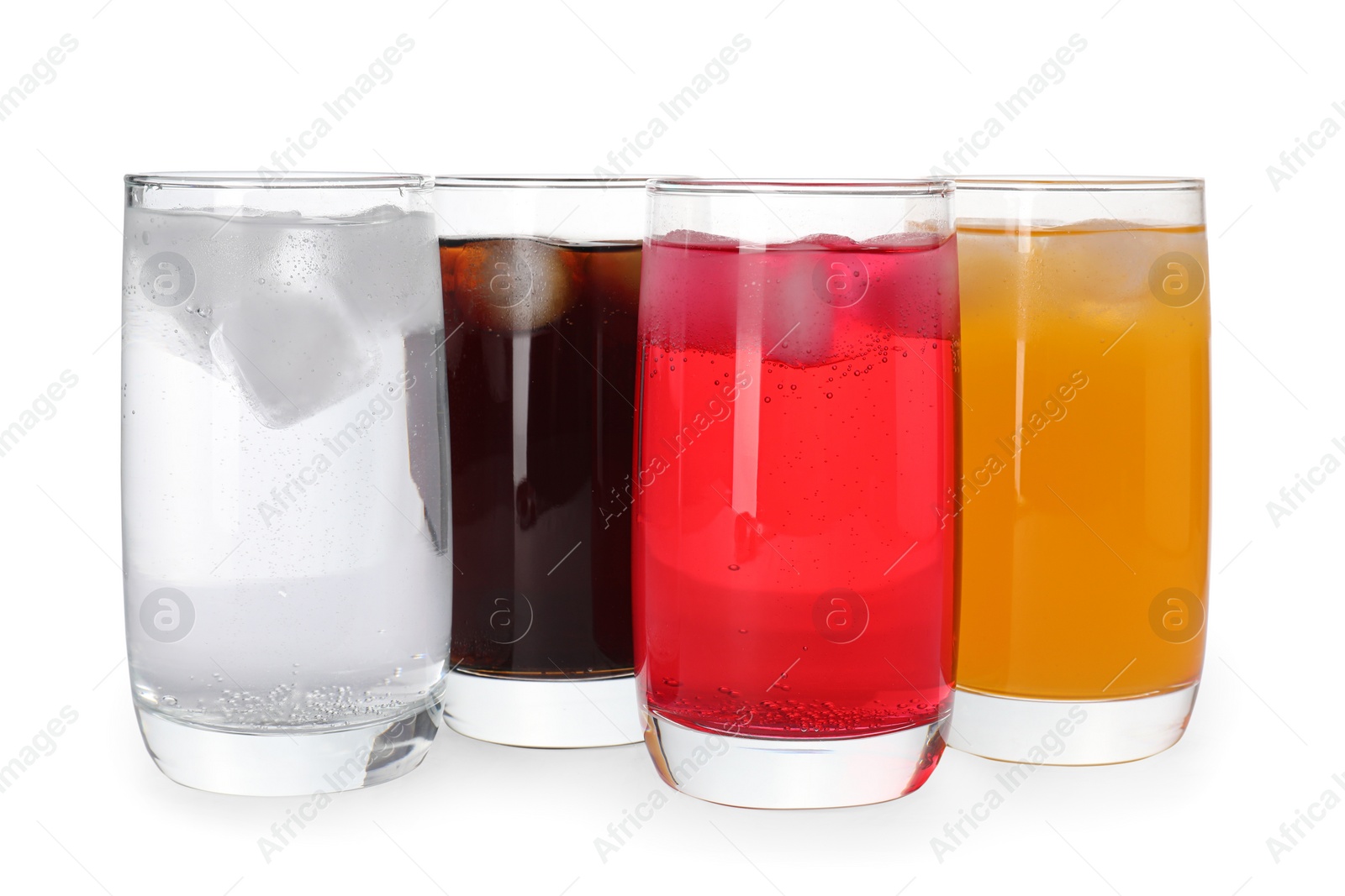 Photo of Glasses of different refreshing soda water with ice cubes on white background