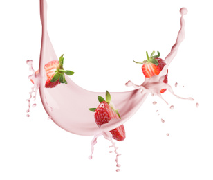 Fresh strawberries with milkshake splash on white background