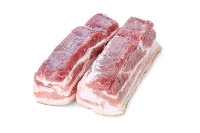 Photo of Pieces of raw pork belly isolated on white