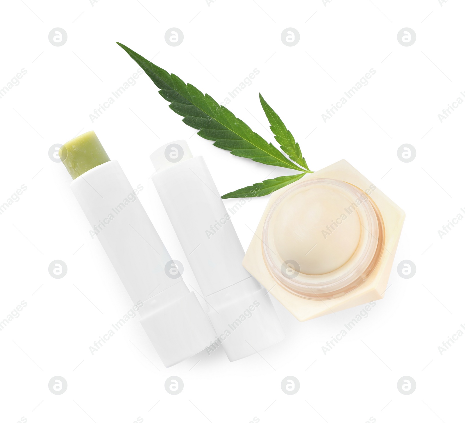 Photo of Different hemp cosmetics and green leaf on white background, top view