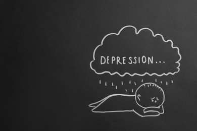 Photo of Drawing of cloud with word DEPRESSION and rain over sad man on black background