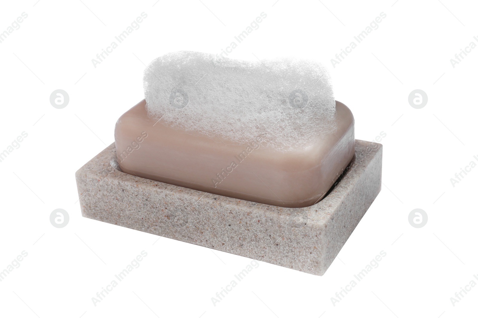 Photo of Soap bar with fluffy foam in holder on white background