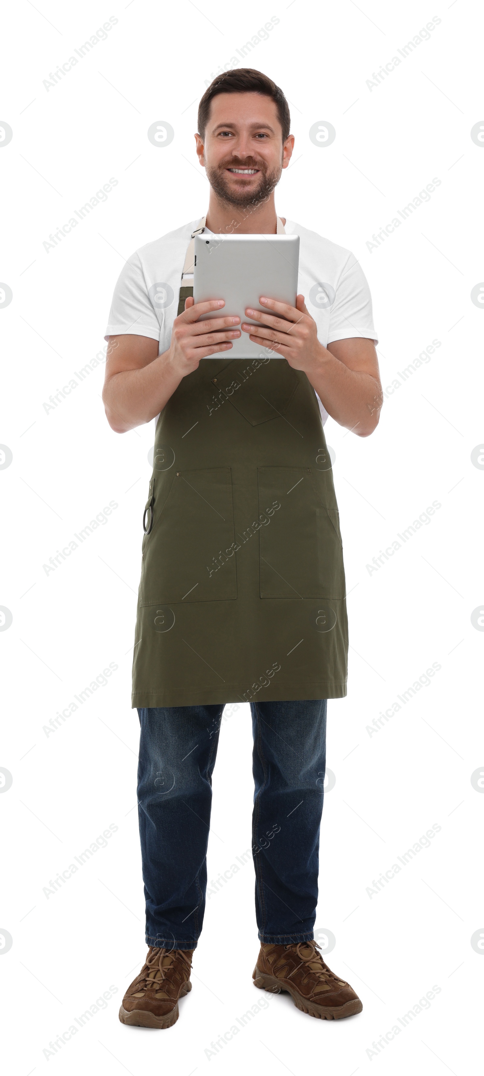 Photo of Smiling man with tablet on white background