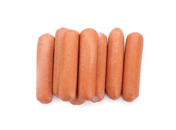 Photo of Fresh raw sausages isolated on white, top view. Meat product