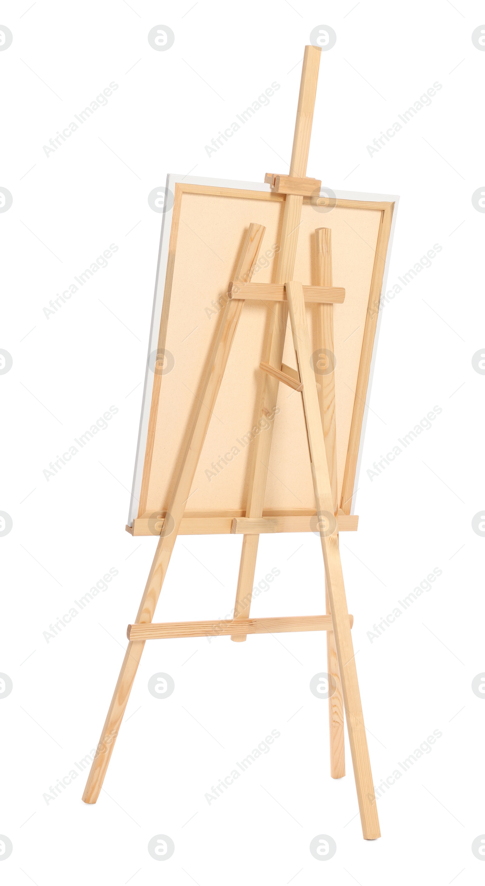 Photo of Wooden easel with canvas isolated on white