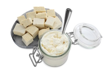 Photo of Different types of tofu cheese on white background