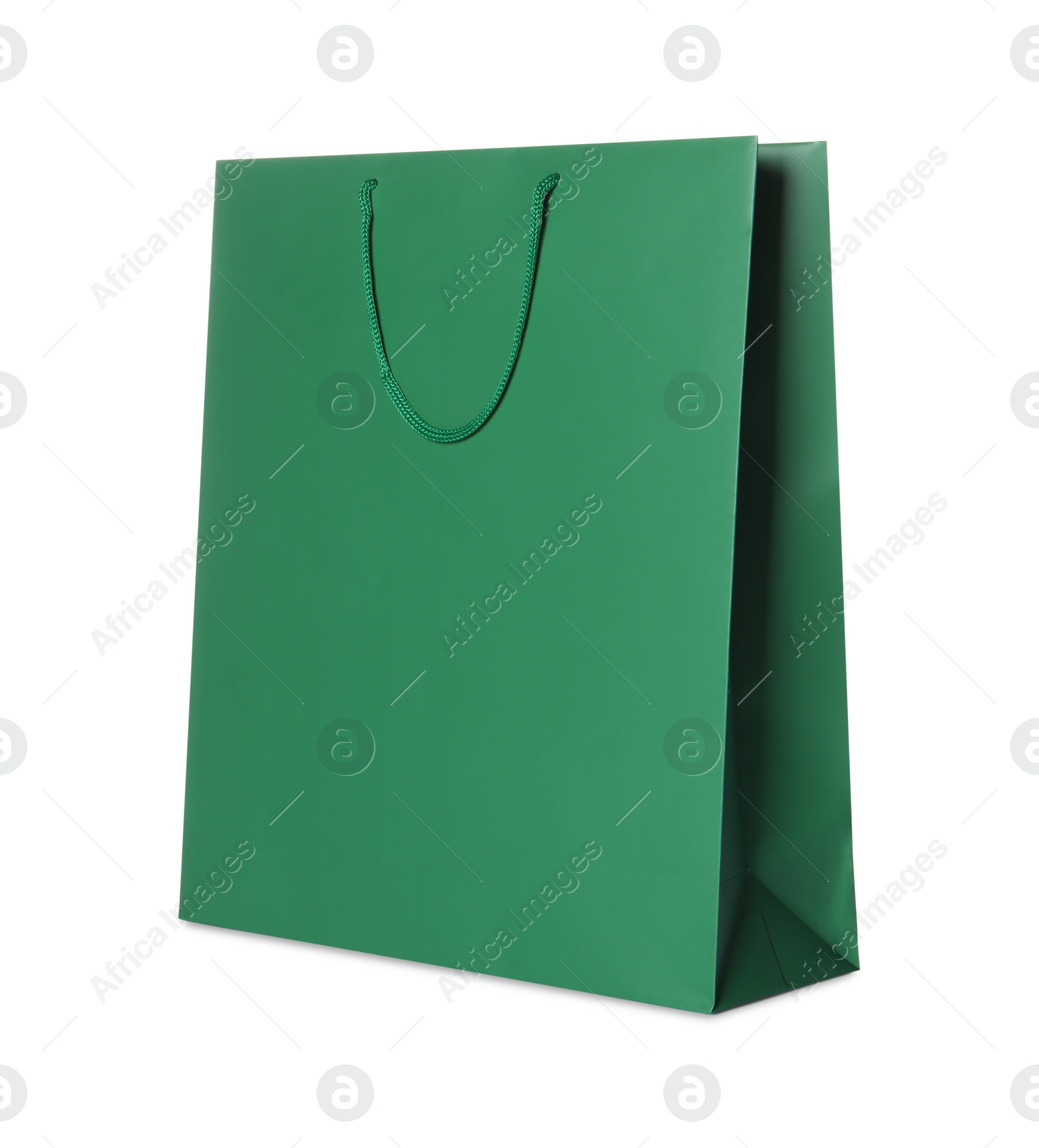 Photo of One green shopping bag isolated on white