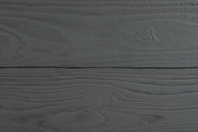 Photo of Texture of grey wooden surface as background, closeup