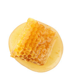 Photo of Piece of tasty fresh honeycomb isolated on white, top view