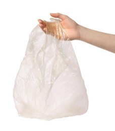 Photo of Woman holding empty plastic bag on white background, closeup