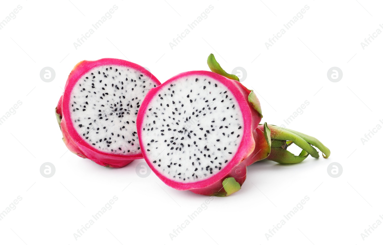 Photo of Halves of delicious ripe dragon fruit (pitahaya) on white background