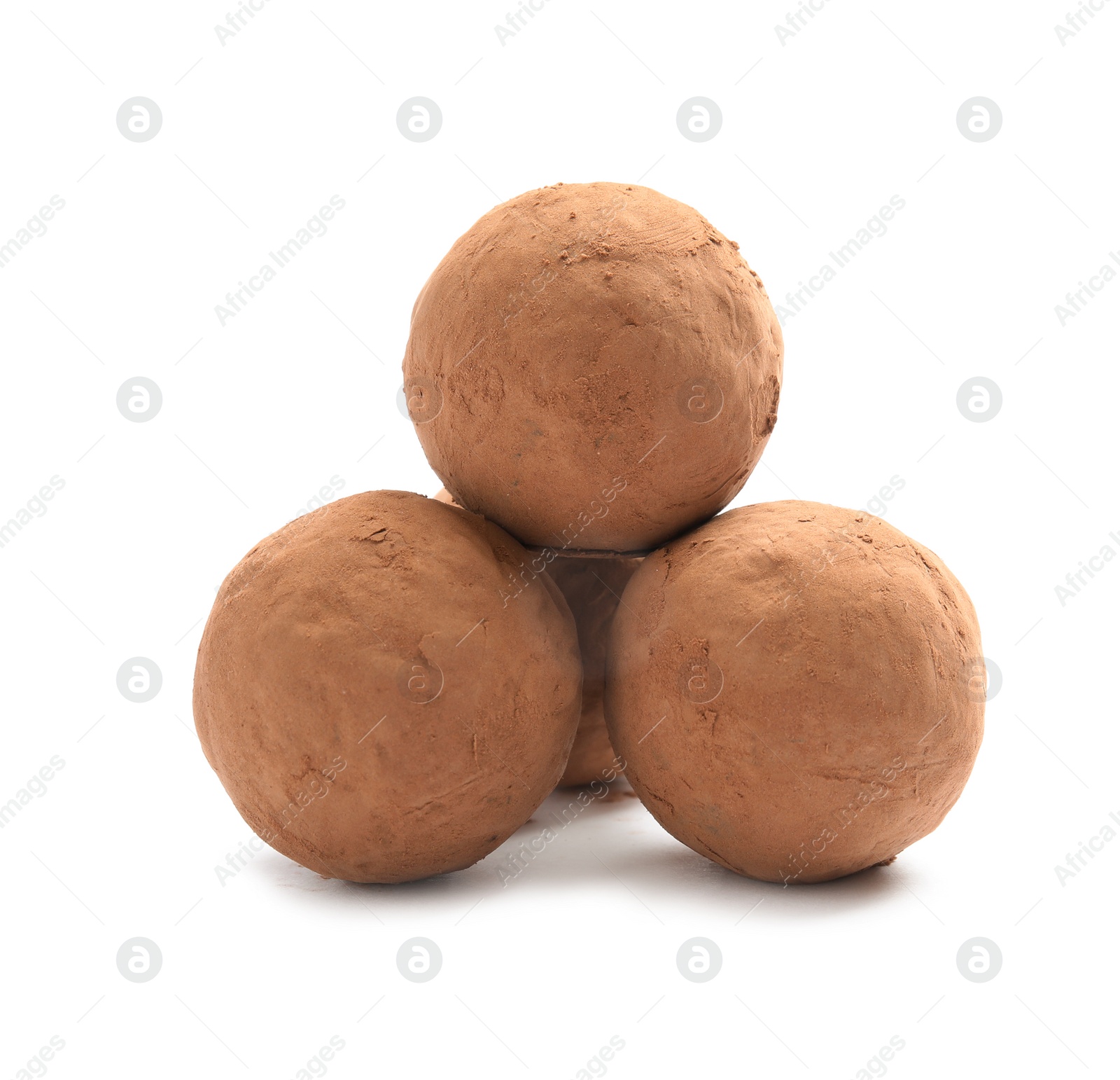 Photo of Delicious raw chocolate truffles on white background