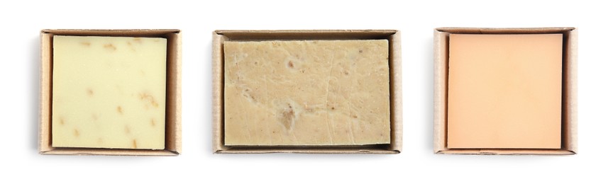 Image of Set with handmade soap bars on white background, top view. Banner design