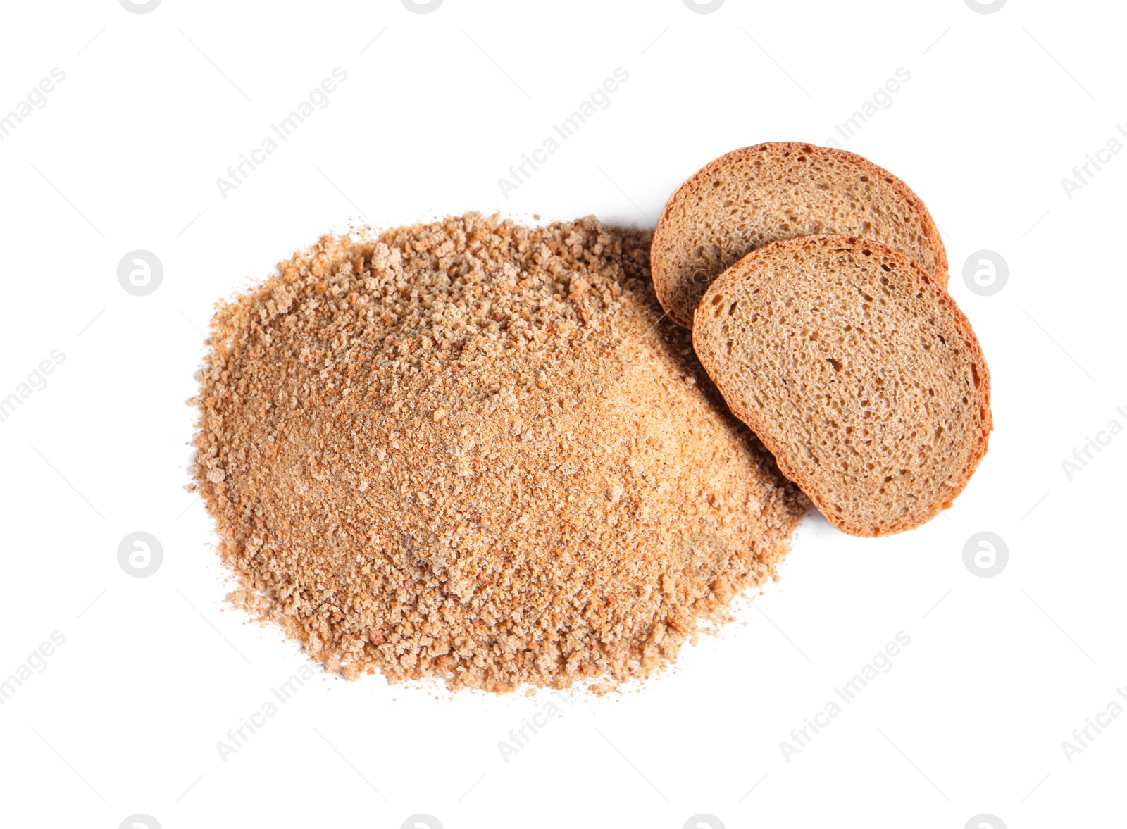 Photo of Fresh bread crumbs and slices of loaf on white background, above view