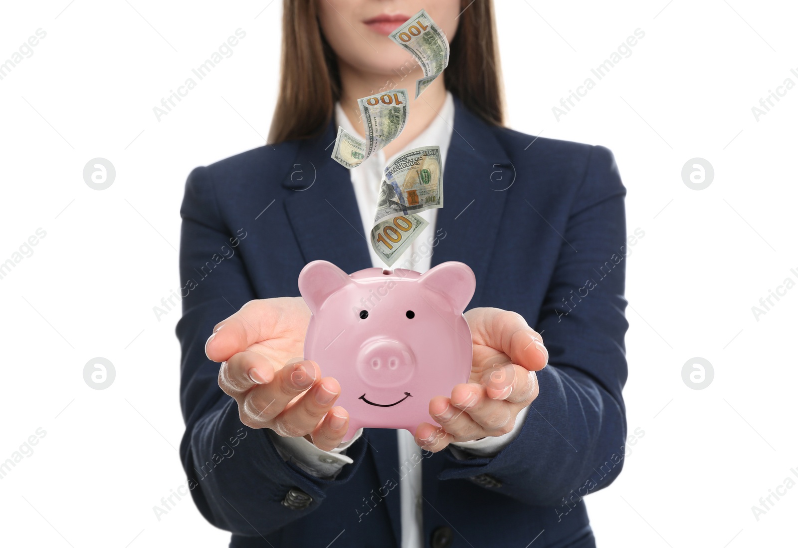 Image of Young woman and American dollars falling into piggy bank on white background, closeup 