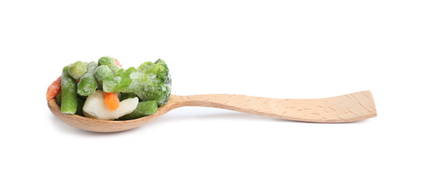 Photo of Frozen vegetables in wooden spoon isolated on white