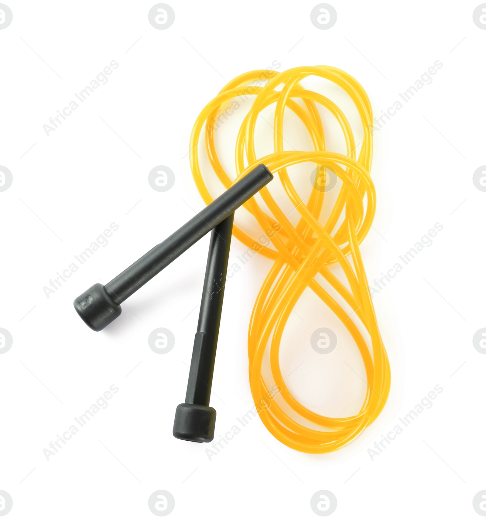 Photo of Yellow skipping rope on white background, top view. Sports equipment