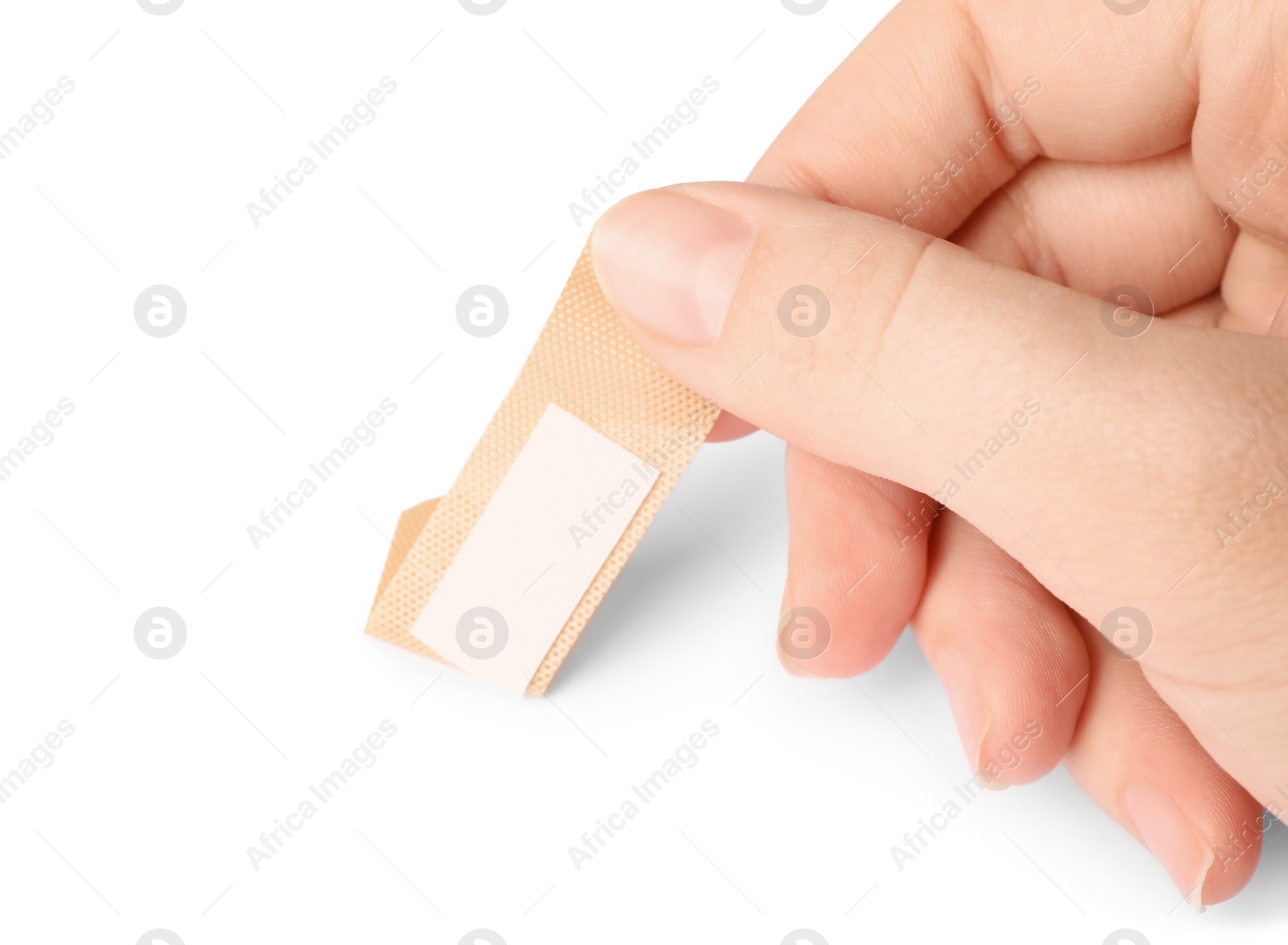 Woman putting sticking plaster on white background. First aid item Photo of Woman putting sticking plaster on white background. First aid item
