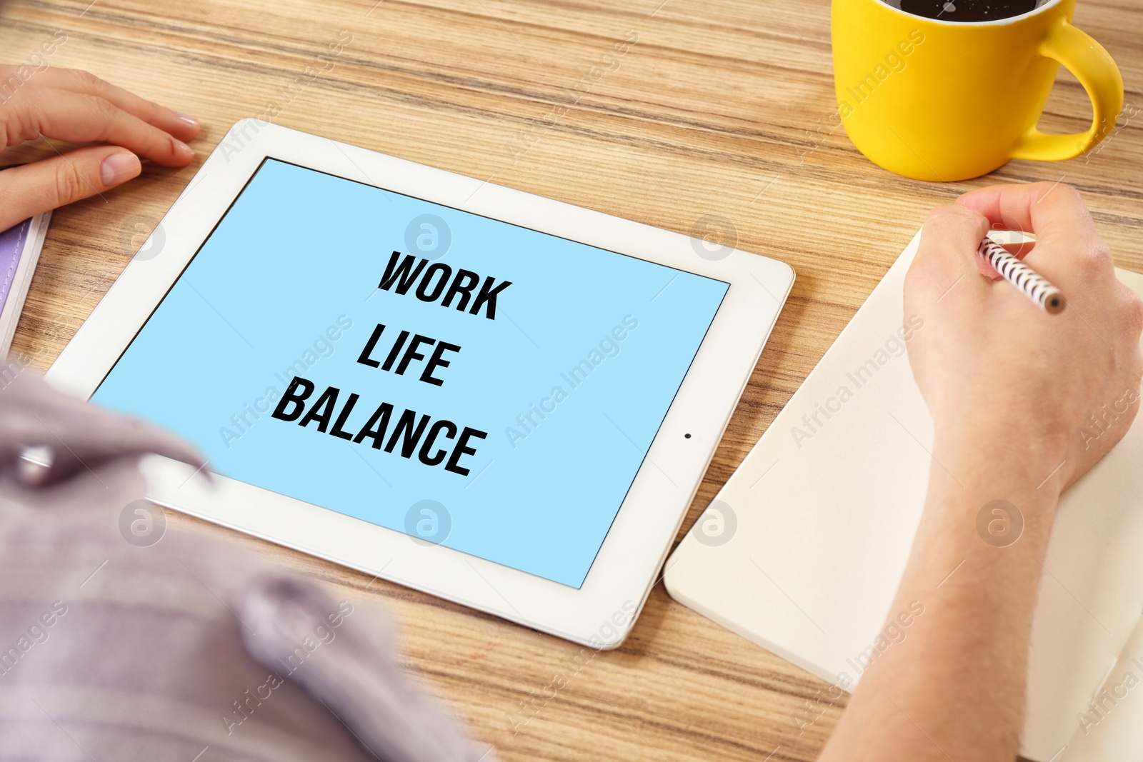 Image of Work-life balance concept. Woman using calendar app on tablet in office, closeup