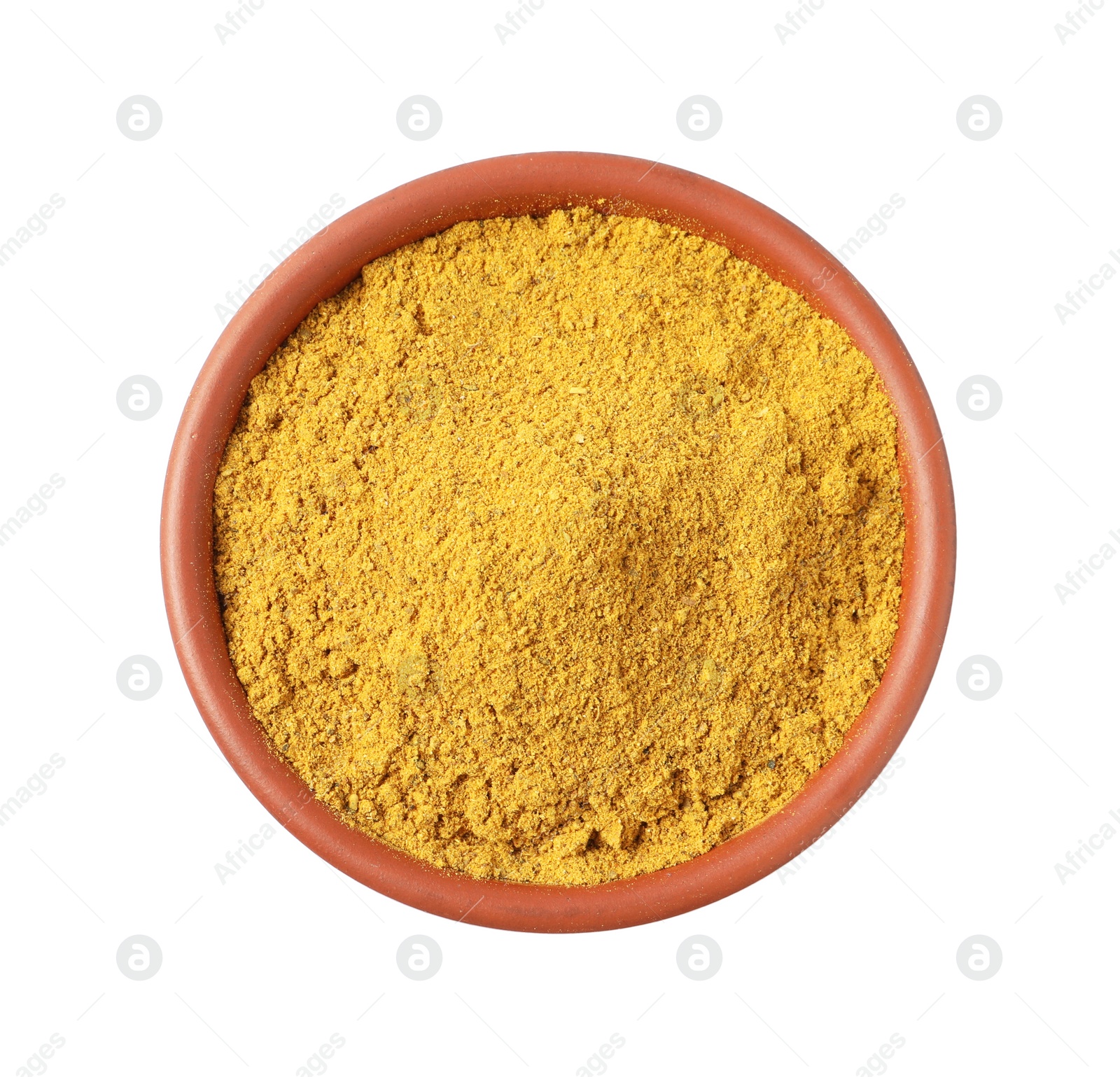 Photo of Curry powder in bowl isolated on white, top view