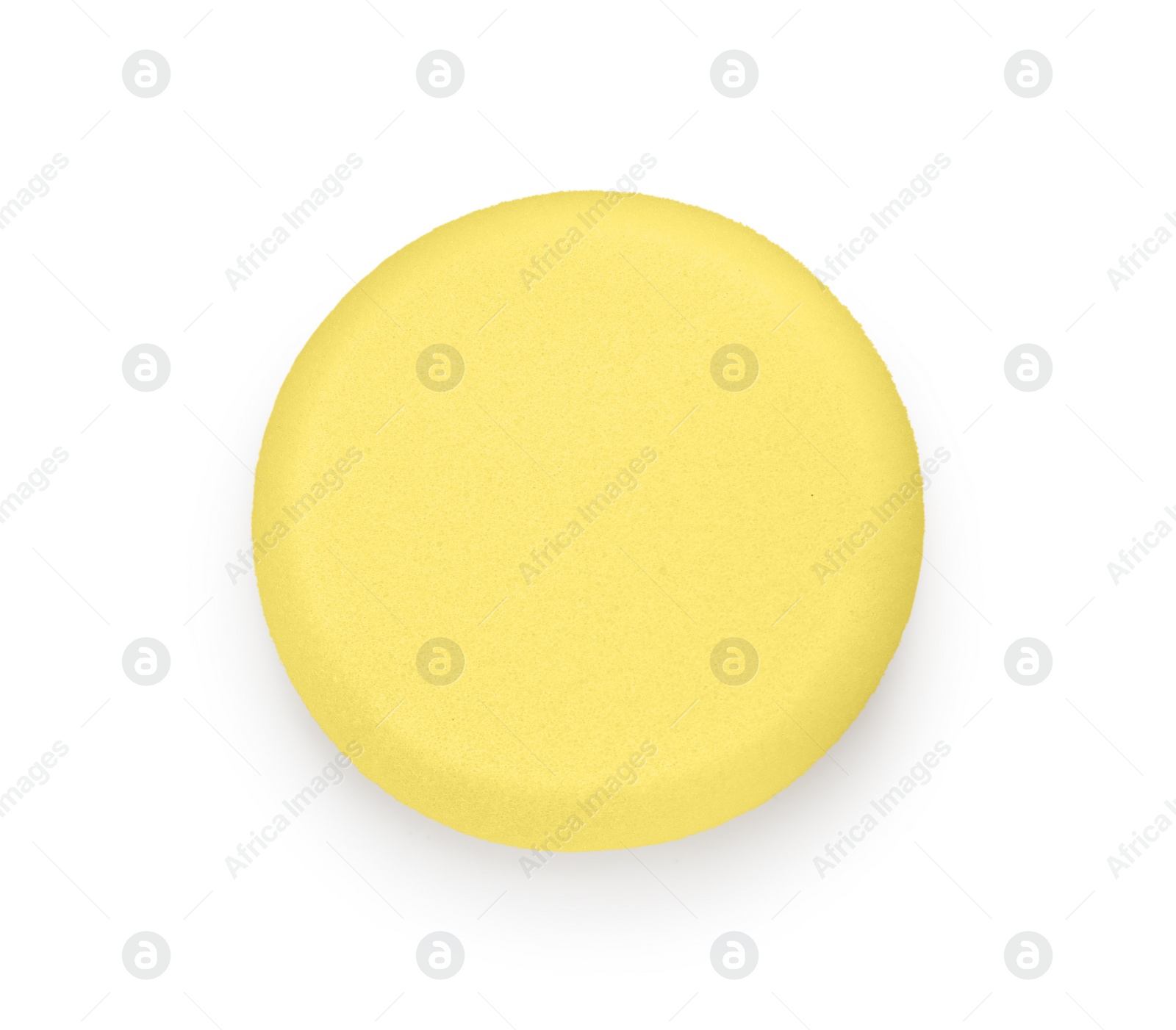 Photo of Clay crafting tool. Yellow pottery sponge isolated on white, top view