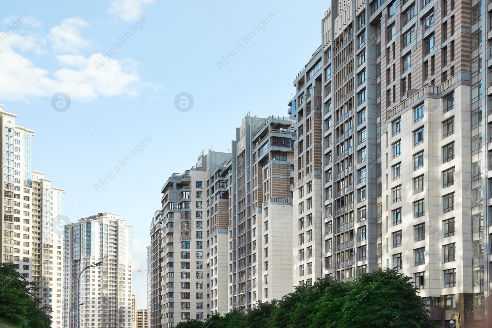 Photo of KYIV, UKRAINE - MAY 21, 2019: Beautiful view of modern housing estate in Pecherskyi district on sunny day