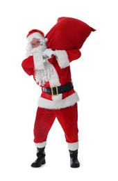 Man in Santa Claus costume with bag posing on white background