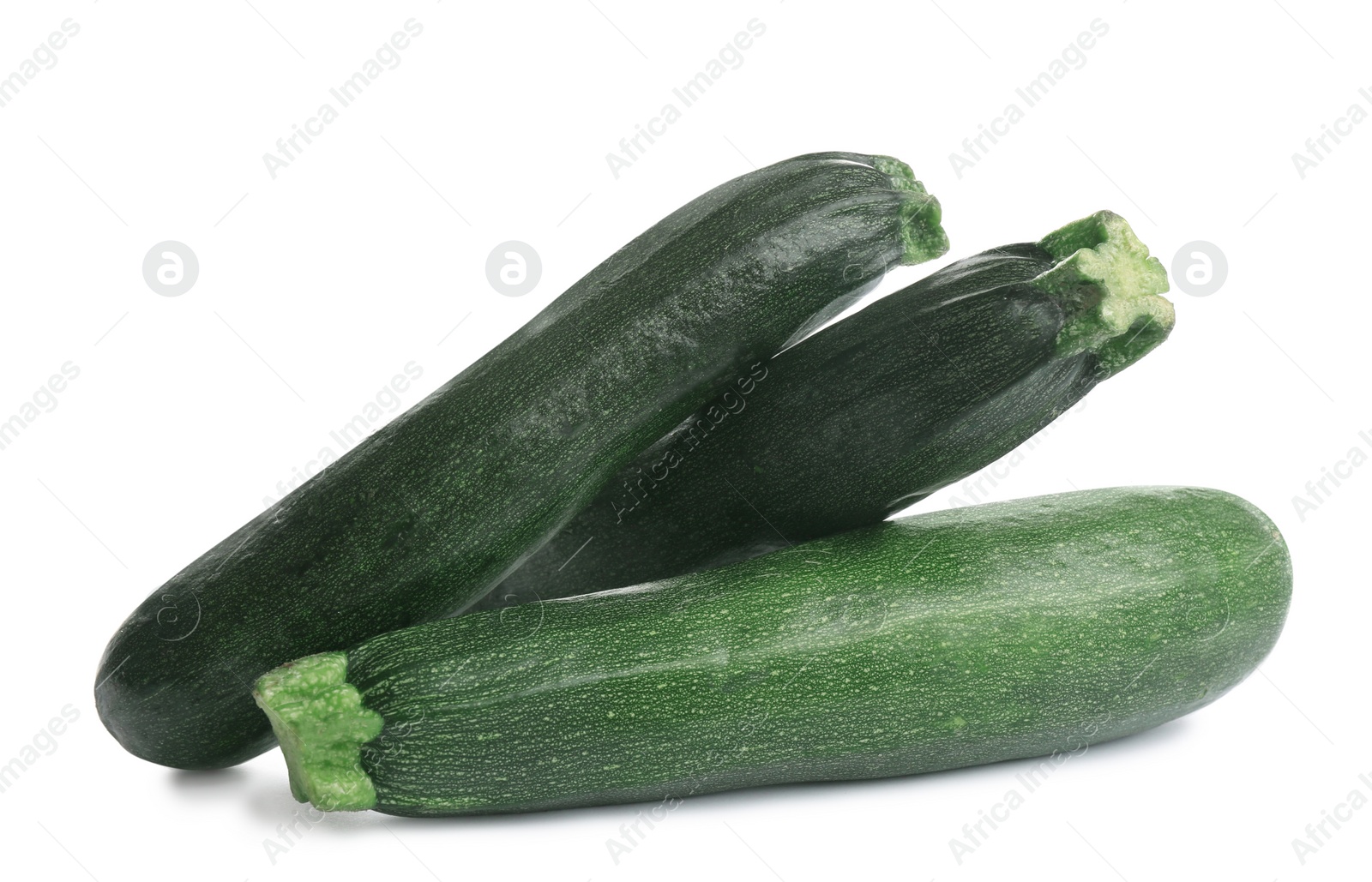 Photo of Fresh ripe green zucchinis isolated on white