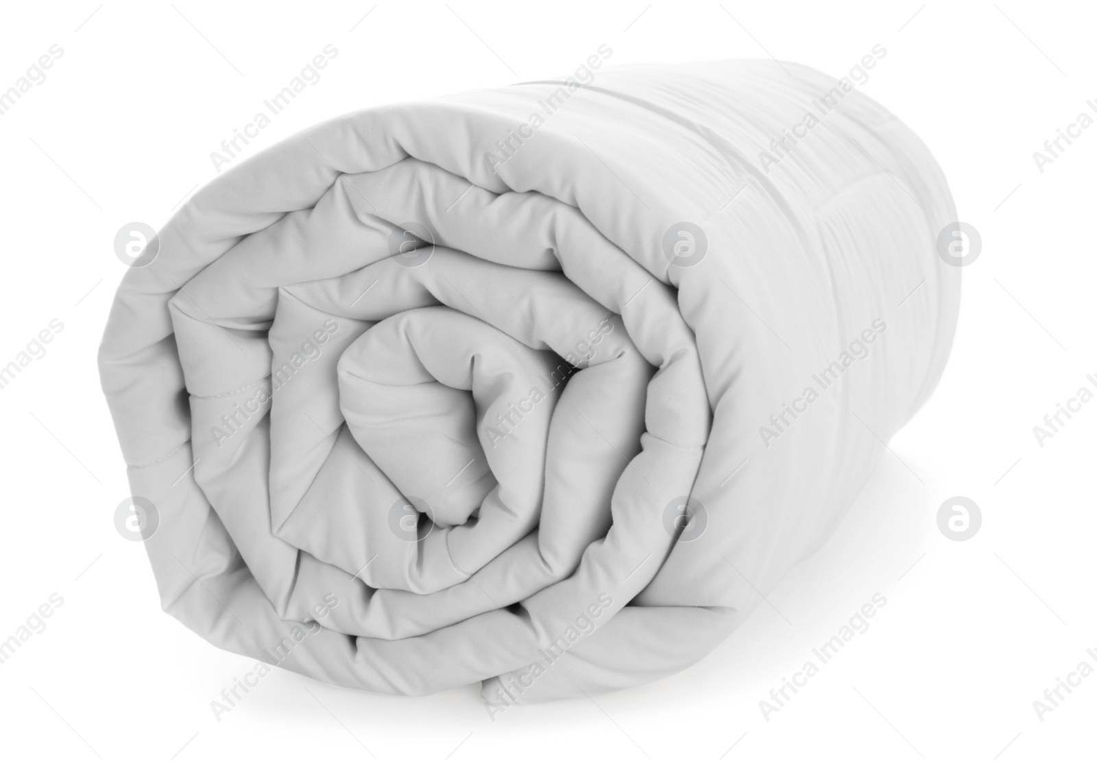 Photo of Rolled clean blanket isolated on white. Household textile