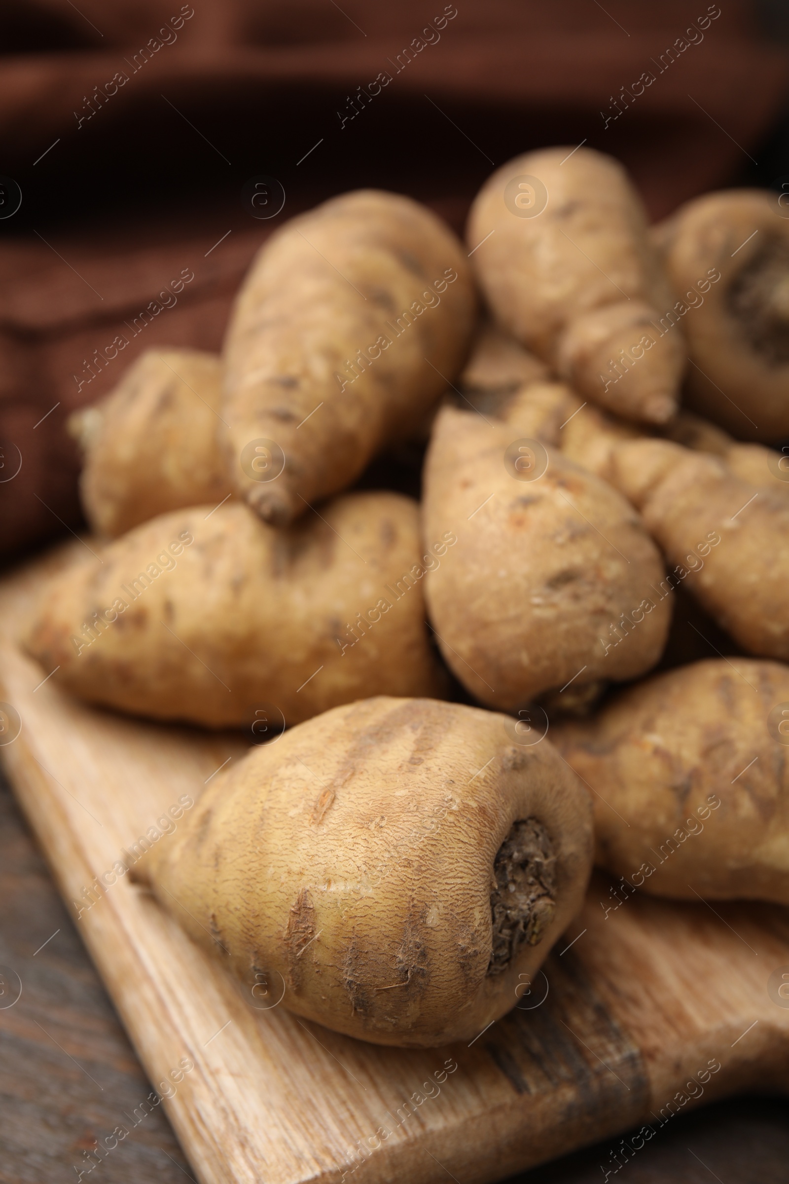 Photo of Tubers of turnip rooted chervil on table, closeup