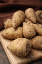 Photo of Tubers of turnip rooted chervil on table, closeup