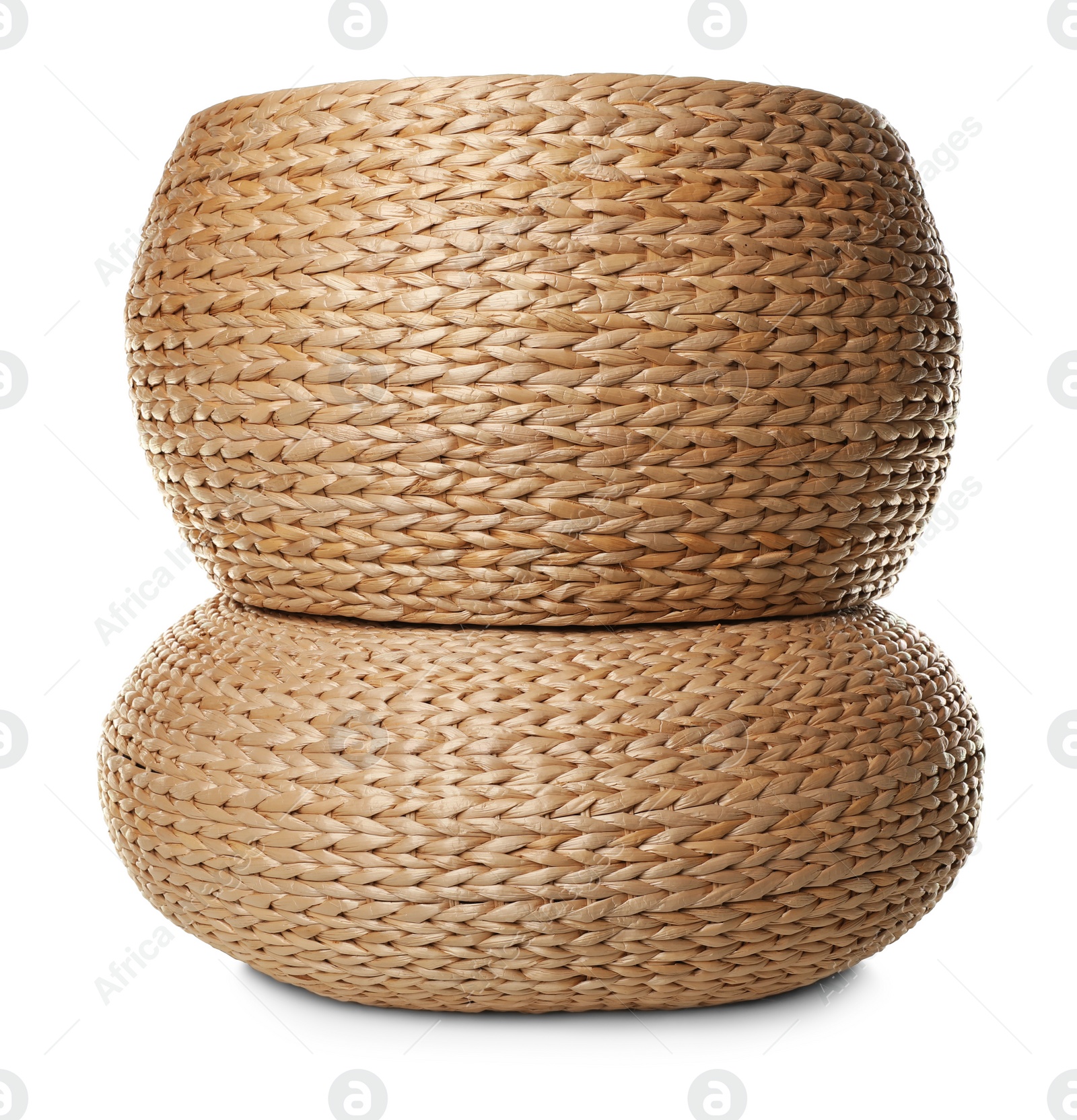 Photo of Two stylish wicker poufs on white background