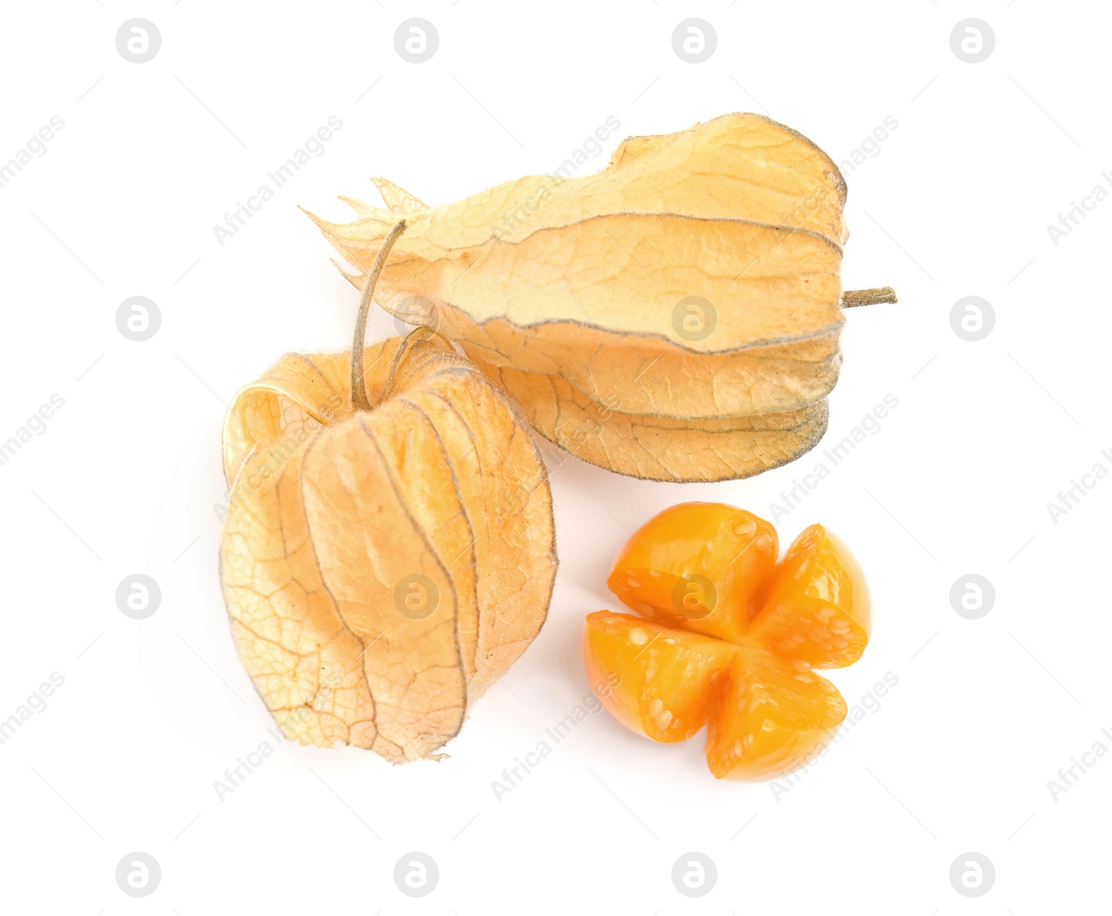 Photo of Cut and whole ripe physalis fruits with dry husk on white background, top view