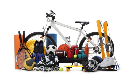 Photo of Bicycle and different modern sport equipment on white background