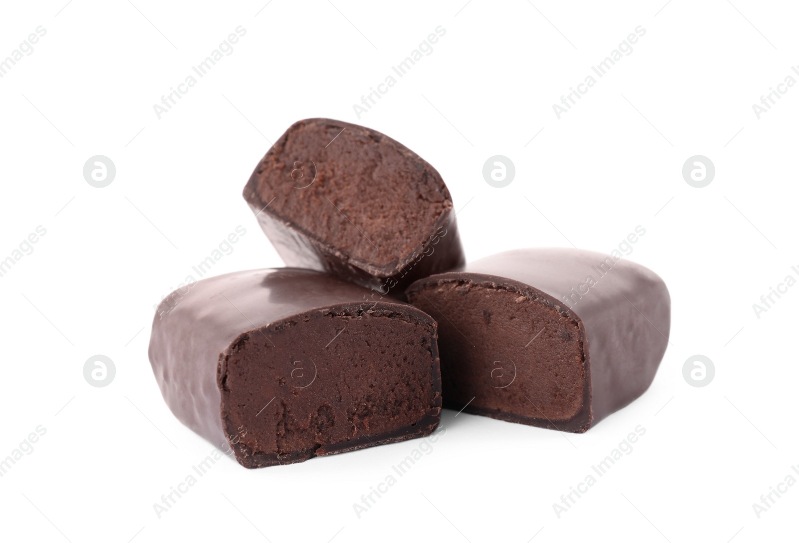 Photo of Delicious cut glazed cheeses with cocoa on white background