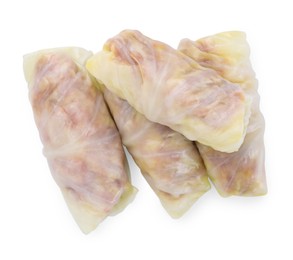 Photo of Uncooked stuffed cabbage rolls isolated on white, top view