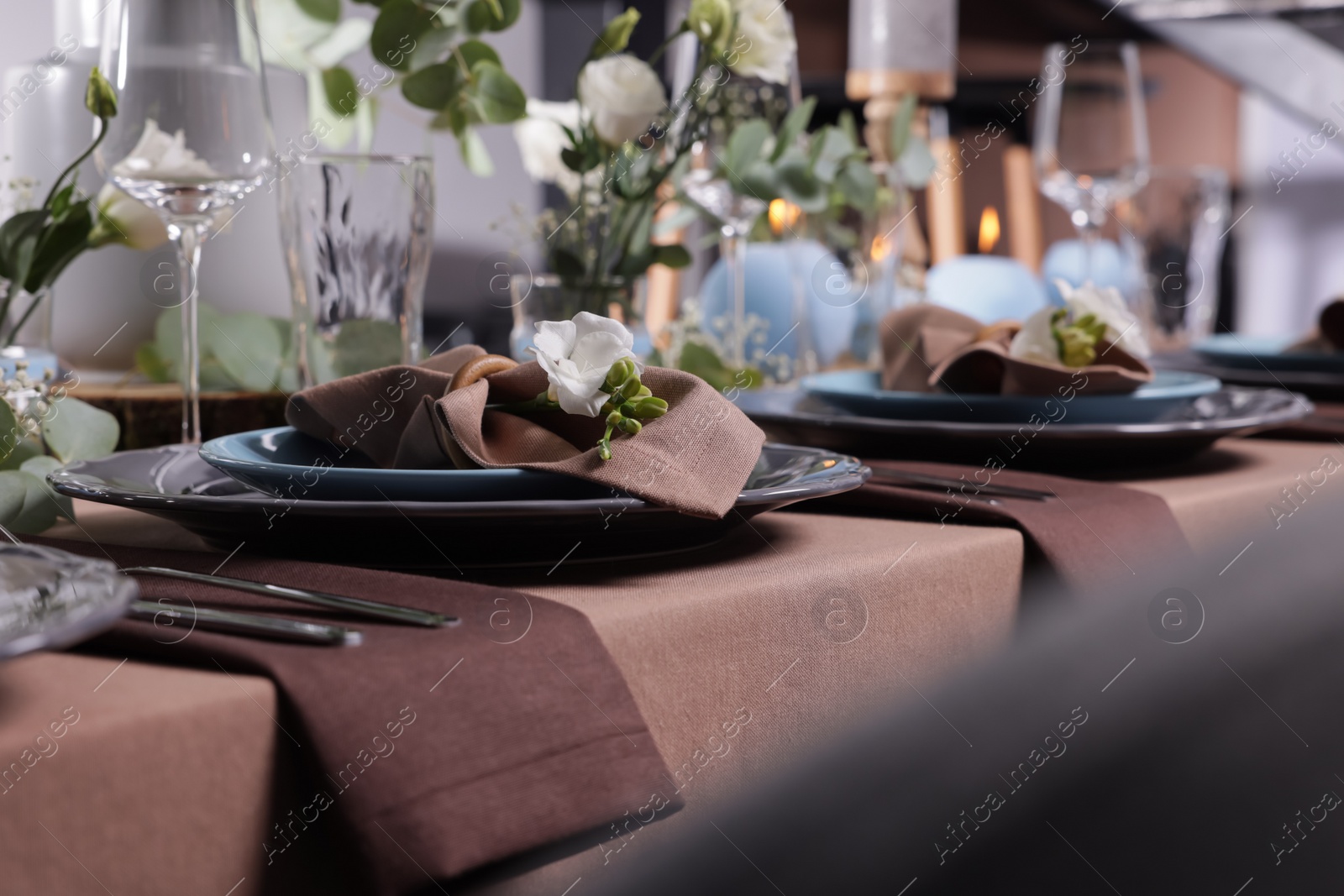 Photo of Elegant table setting with beautiful floral decor