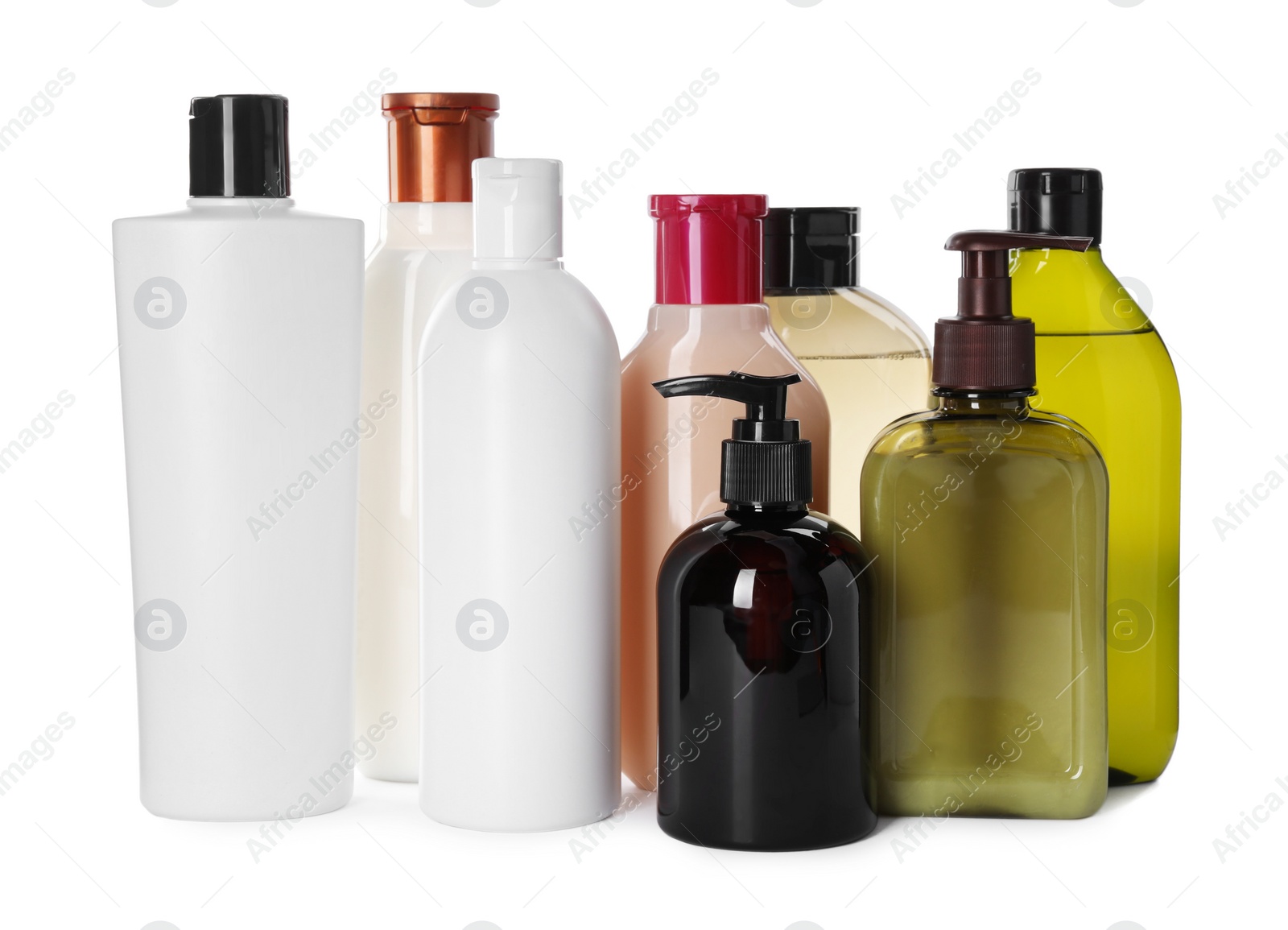 Photo of Different bottles of shampoo on white background