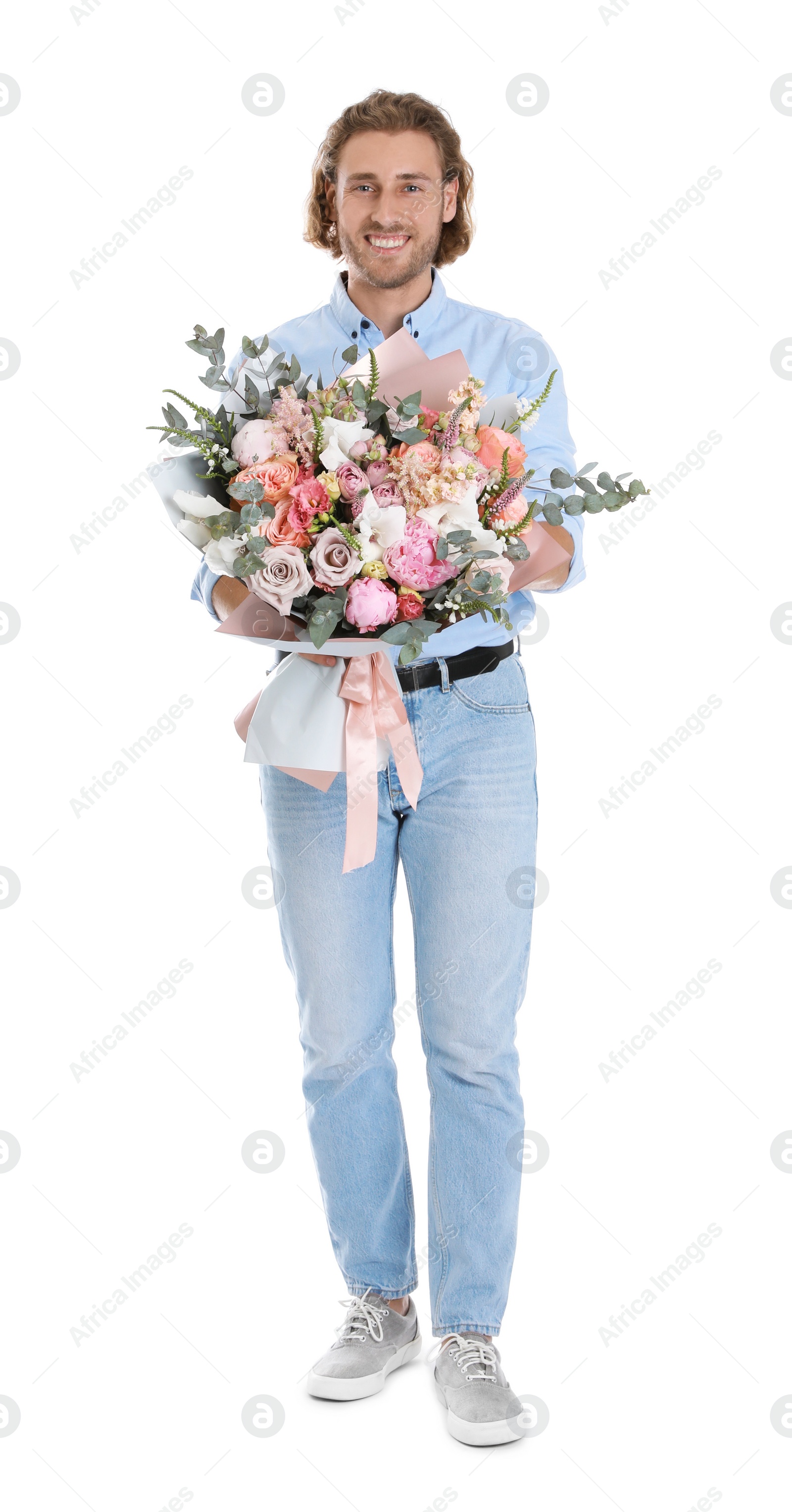 Photo of Young handsome man with beautiful flower bouquet on white background