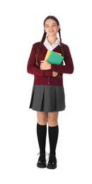 Teenage girl in school uniform with books on white background