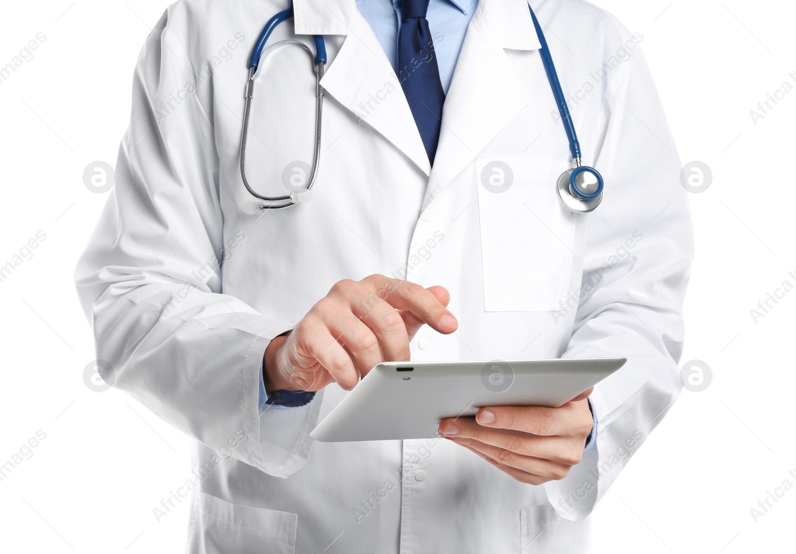 Photo of Male doctor holding modern tablet on white background, closeup