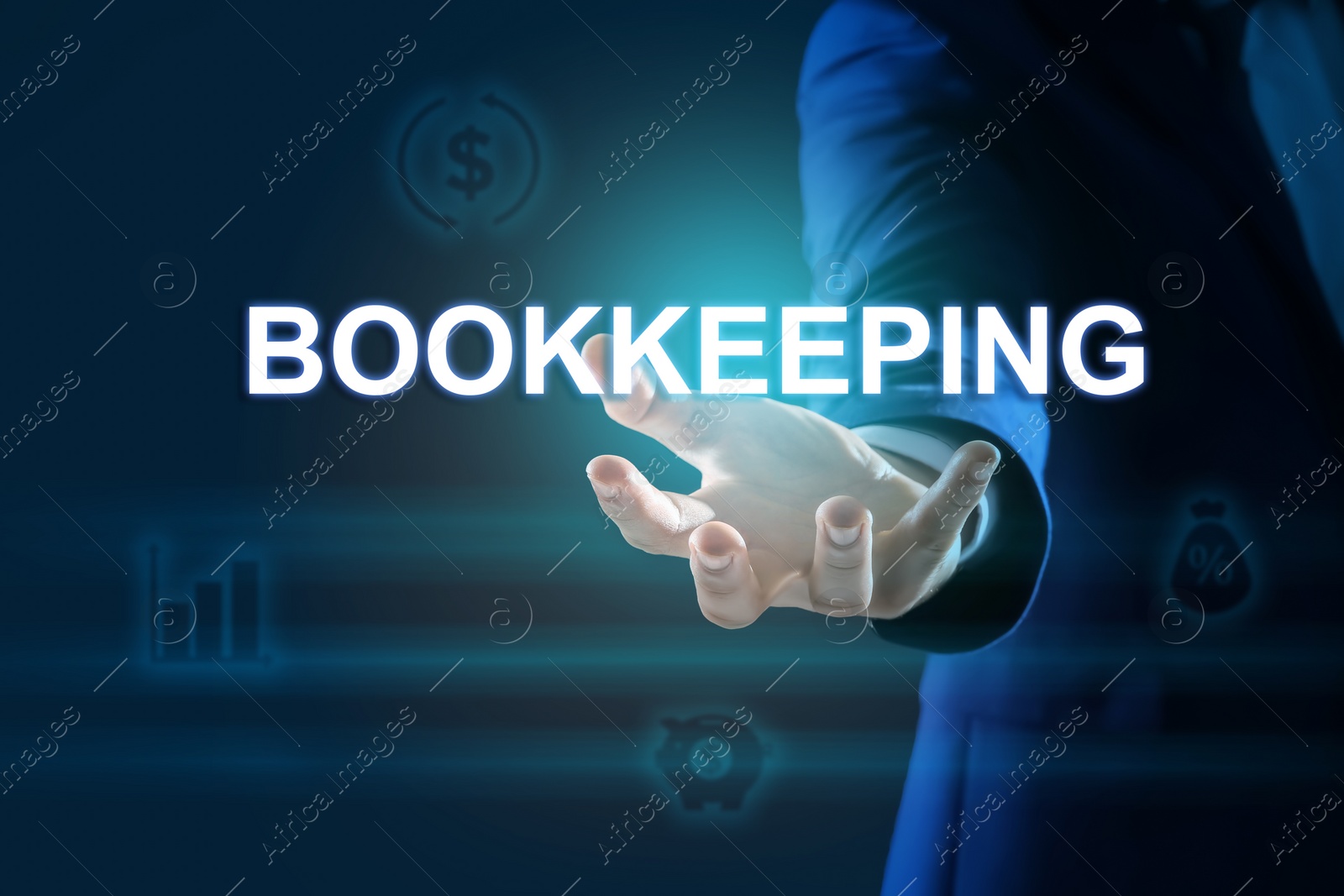 Image of Bookkeeping concept. Businessman holding word on dark blue background with digital icons, closeup