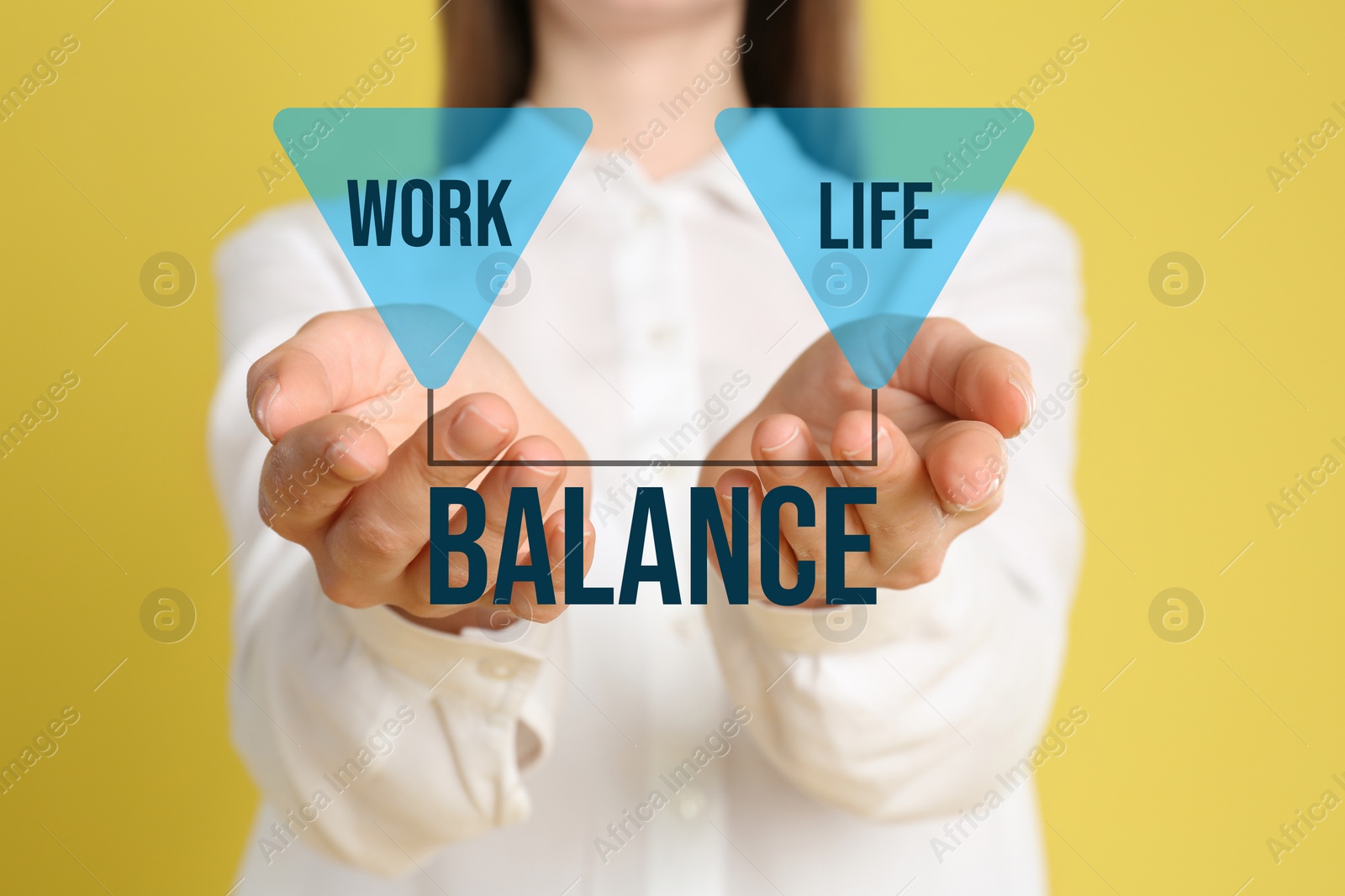 Image of Woman demonstrating phrase Work-life balance on yellow background, closeup