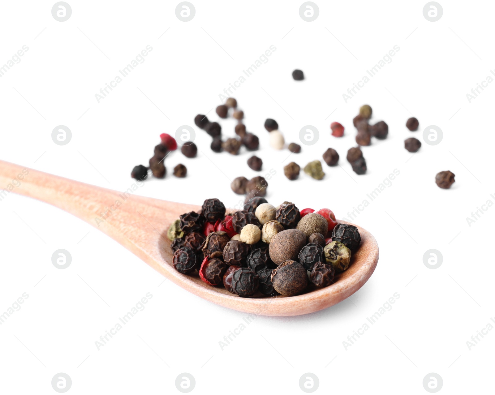 Photo of Mix of different pepper grains isolated on white