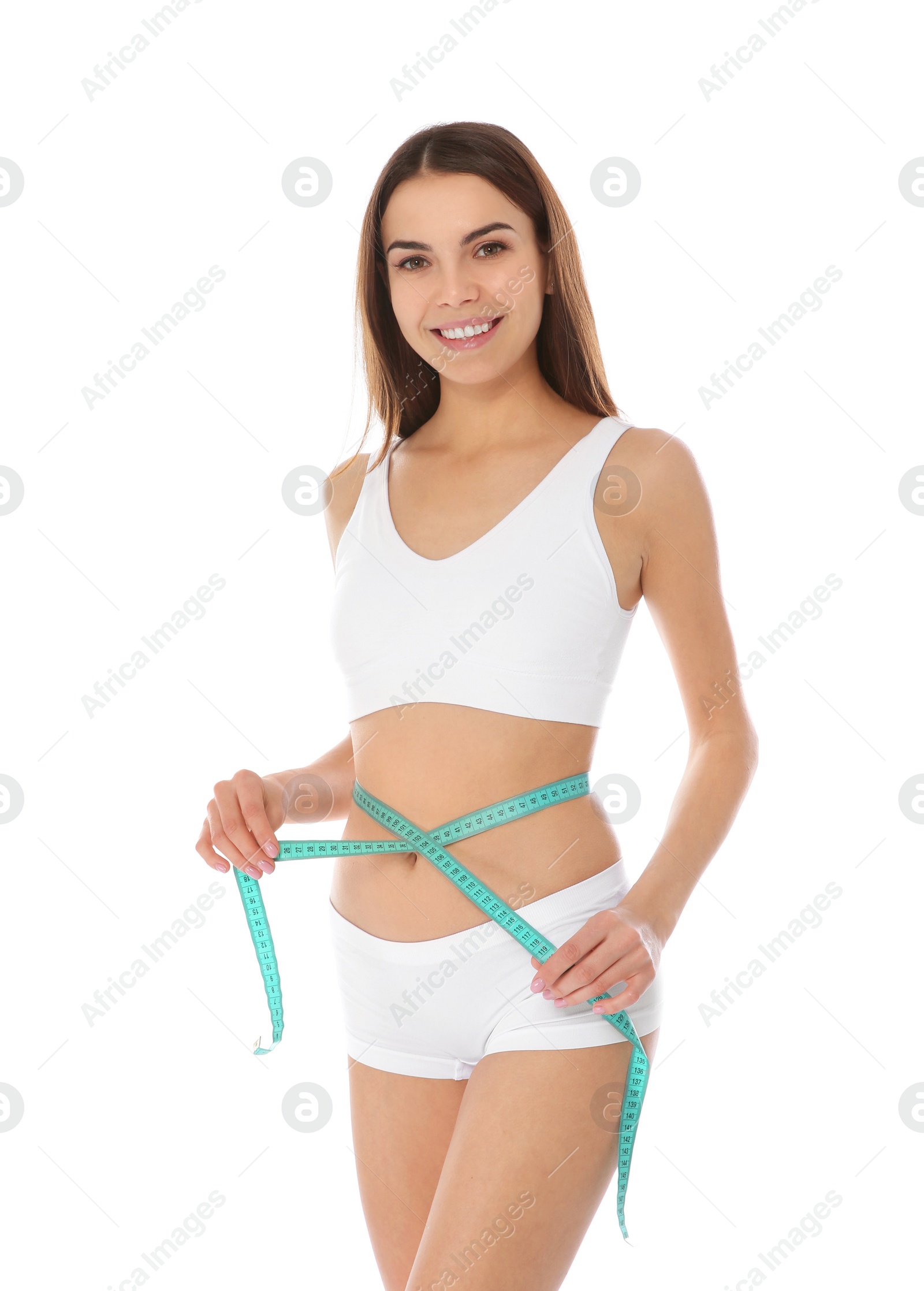 Photo of Slim woman measuring her waist on white background. Weight loss