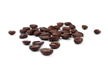 Photo of Fresh roasted coffee beans on white background