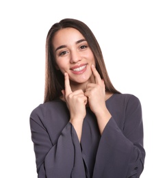 Photo of Woman showing LAUGH gesture in sign language on white background