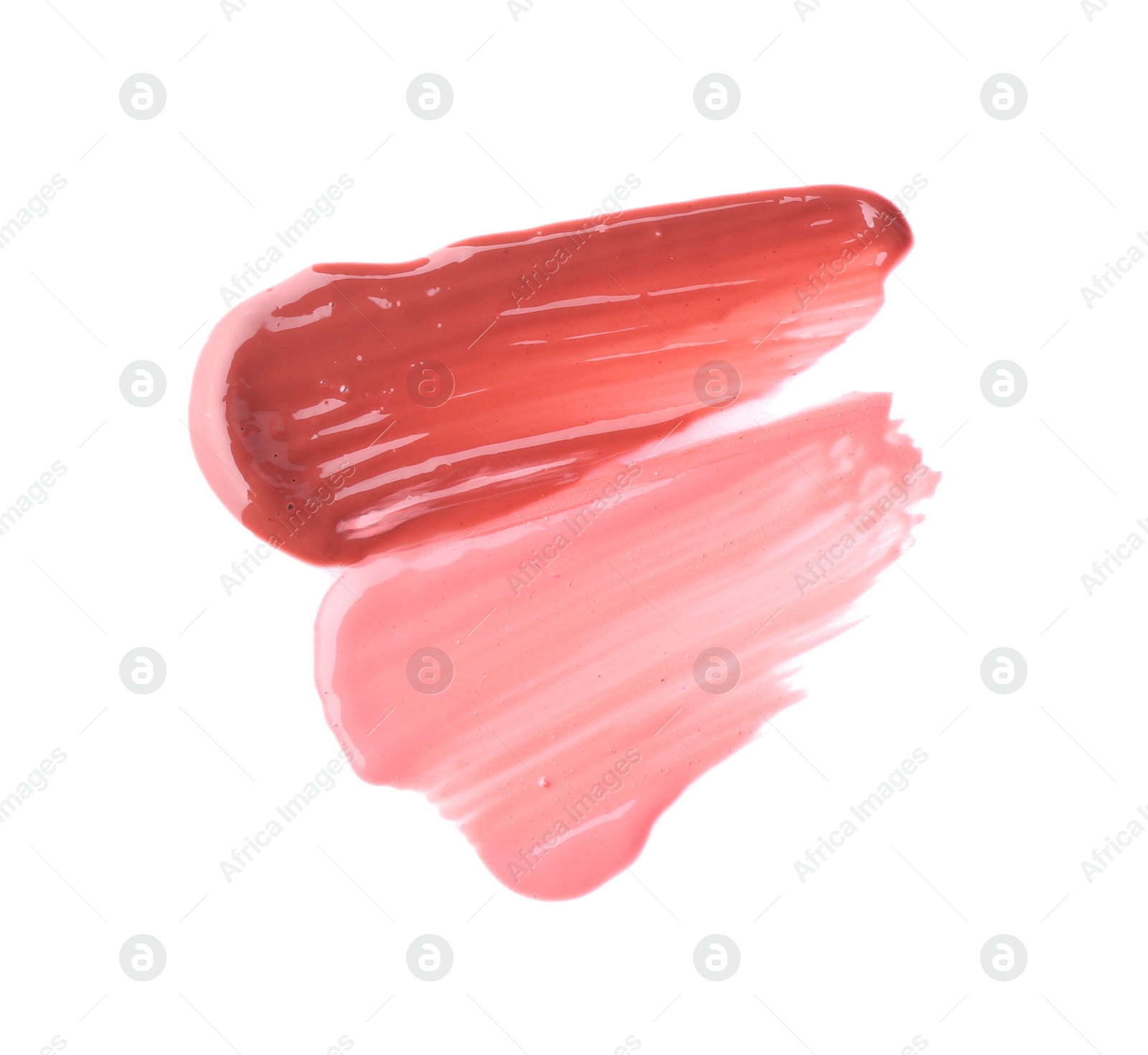 Photo of Strokes of color lip glosses isolated on white, top view