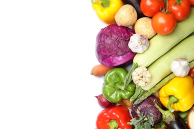 Many fresh ripe vegetables on white background, top view. Space for text