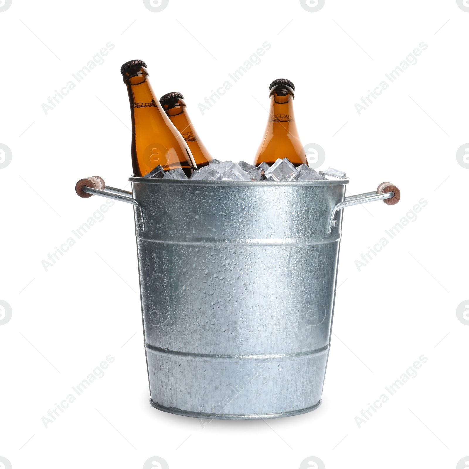 Photo of Metal bucket with bottles of beer and ice cubes isolated on white